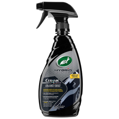 Bottle of Turtle Wax Hybrid Solutions Ceramic Acrylic Black Car Wax Spray for black paint finishes. Bottle of Turtle Wax Hybrid Solutions Ceramic Acrylic Black Car Wax Spray for black paint finishes.