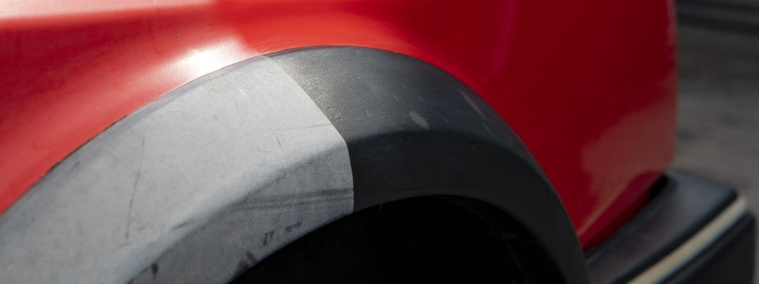 Faded car plastic trim before restoration in Waxhaw NC