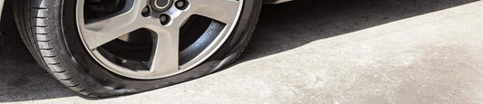 HOW TO CHANGE A FLAT TIRE