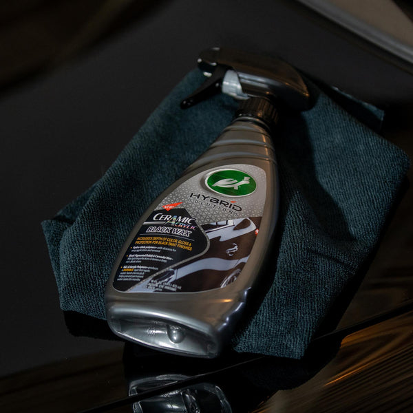 Lifestyle photo of air freshener inside a car, showing dashboard and vent placement.