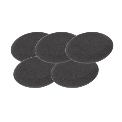 Five black, round, porous foam pads for car detailing are stacked on a white background.