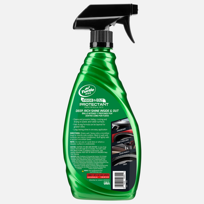 Turtle Wax inside and out car protectant in green spray bottle. Dashboard, trim, and tires pictured. Made in the USA.
