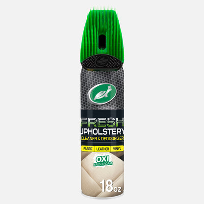 Turtle Wax Upholstery Cleaner, carpet and fabric stain and odor eliminator. It has a green brush-top applicator for car interiors.