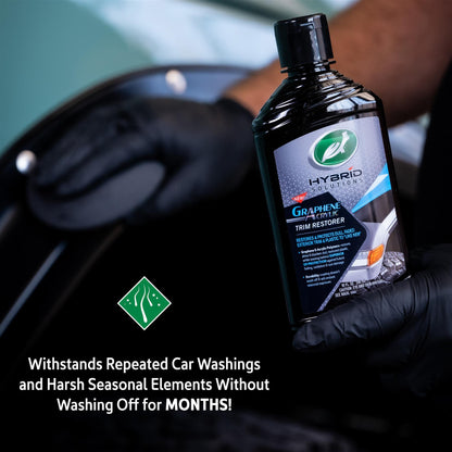 Turtle Wax Hybrid Solutions Graphene Acrylic Trim Restorer bottle. Car detailing product to restore, shine, and protect exterior trim.