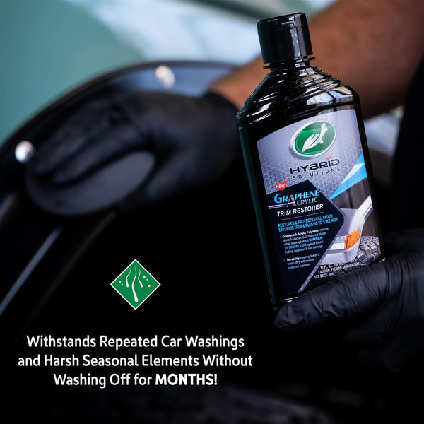 A hand holds trim restorer and a black applicator pad with text overlay reading "withstands repeated car washings and harsh seasonal elements without washing off for months!"