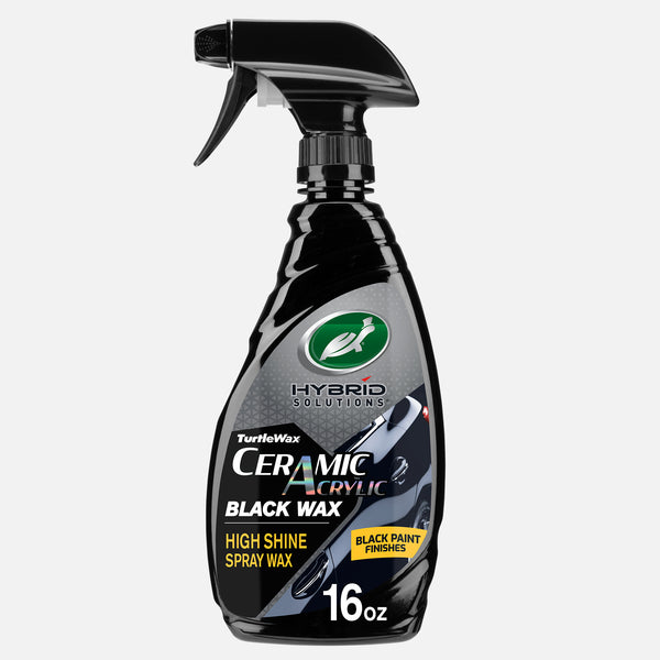Bottle of Turtle Wax Hybrid Solutions Ceramic Acrylic Black Car Wax Spray for black paint finishes.