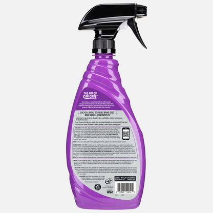 Purple spray bottle of Turtle Wax wheel cleaner. Dissolves brake dust and iron particles. Color changing formula. Made in USA.
