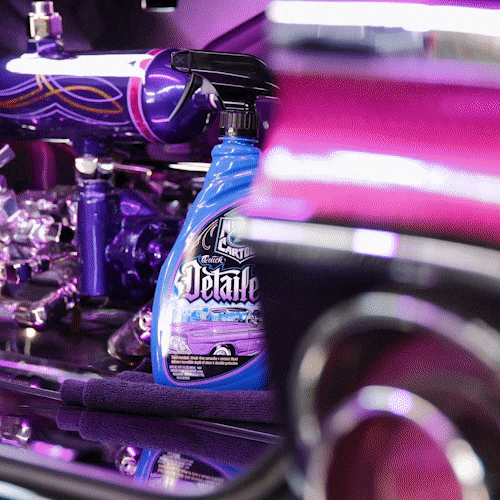 GIF of Mr. Cartoon Quick Detailer being sprayed onto a car panel and wiped to reveal a deep shine.