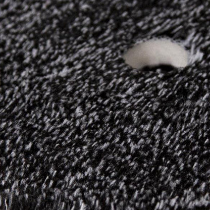 Close up of a 50/50 microfiber detailing pad. Dense black & white fibers. Excellent car care.