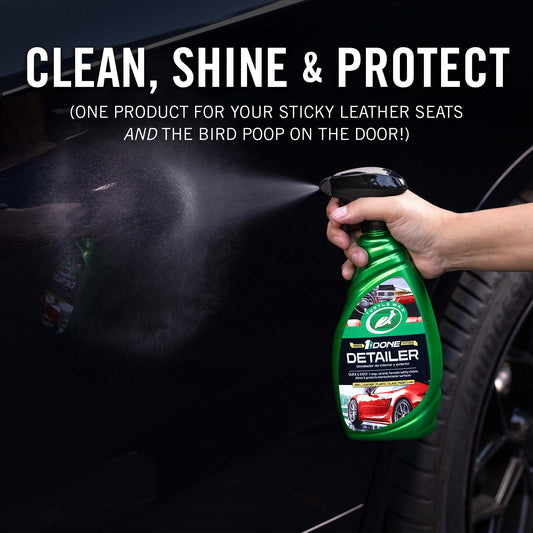 Image showing a person using 1& Done detailer on a black car. 