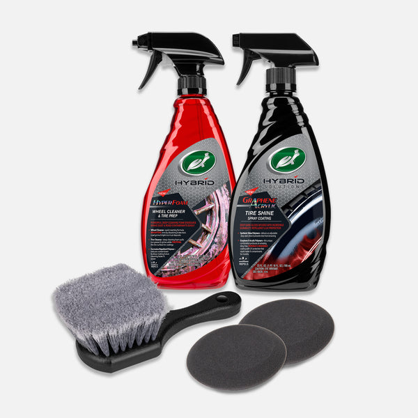 Turtle Wax wheel and tire care kit featuring Hybrid Solutions Hyperfoam Wheel Cleaner & Tire Prep, Graphene Acrylic Tire Shine, a brush, and applicators.