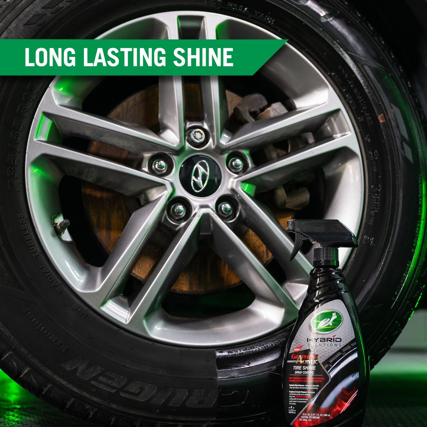 Detailing a tire and wheel with Turtle Wax Hybrid Solutions. Graphene Acrylic Tire Shine for dark gloss and durable protection.