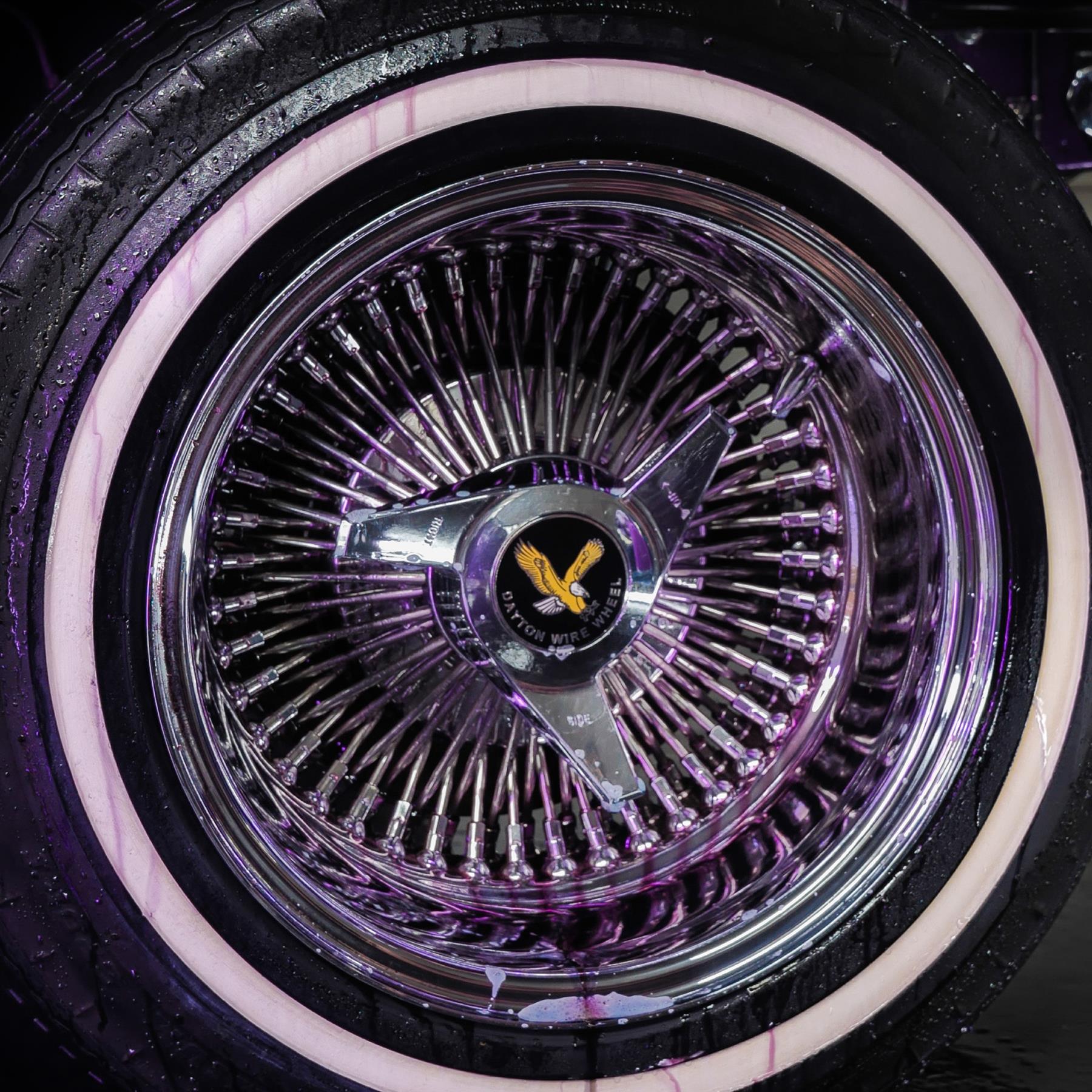 Dayton Wire Wheel with whitewall tire after wheel cleaner application. Car detailing.