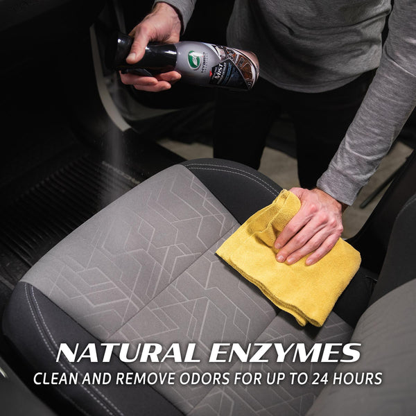 Side-by-side view of cleaned and dirty vehicle panel after spray use.